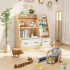 Étagère à livres pour enfants SUGIFT, organisateur de cubes et rangement de jouets avec bacs en tissu, présentoir à livres frontal, organisateur en bois pour salle de jeux et chambre d'enfant.