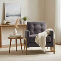 Fauteuil rembourré Okak moderne et élégant à dossier capitonné avec cadre en bois massif, chaise de lecture et de détente pour salons, zones de relaxation