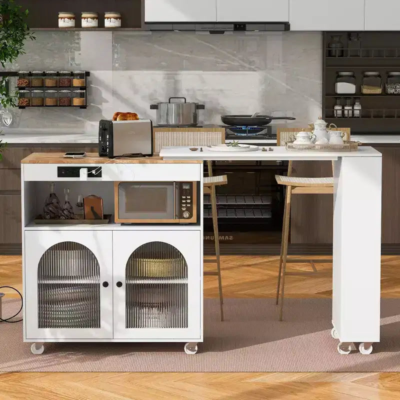 Okak Îlot de cuisine sur roulettes avec 2 portes vitrées, chariot de cuisine avec plateau extensible et prises électriques, îlot de cuisine avec étagères latérales ouvertes