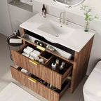 Meuble-lavabo de salle de bain moderne cannelé avec lavabo en céramique intégré, armoire de rangement autoportante avec 3 tiroirs pour salle de bain contemporaine.