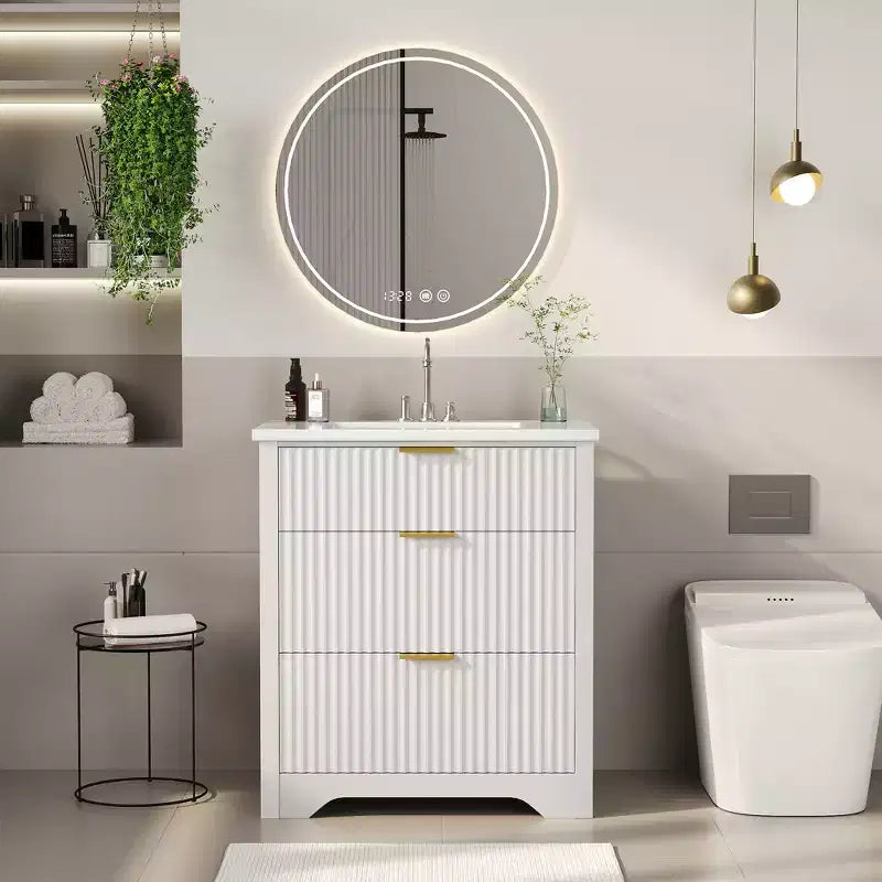 Meuble-lavabo de salle de bain moderne cannelé avec lavabo en céramique intégré, armoire de rangement autoportante avec 3 tiroirs pour salle de bain contemporaine.