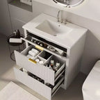 Meuble-lavabo de salle de bain moderne cannelé avec lavabo en céramique intégré, armoire de rangement autoportante avec 3 tiroirs pour salle de bain contemporaine.