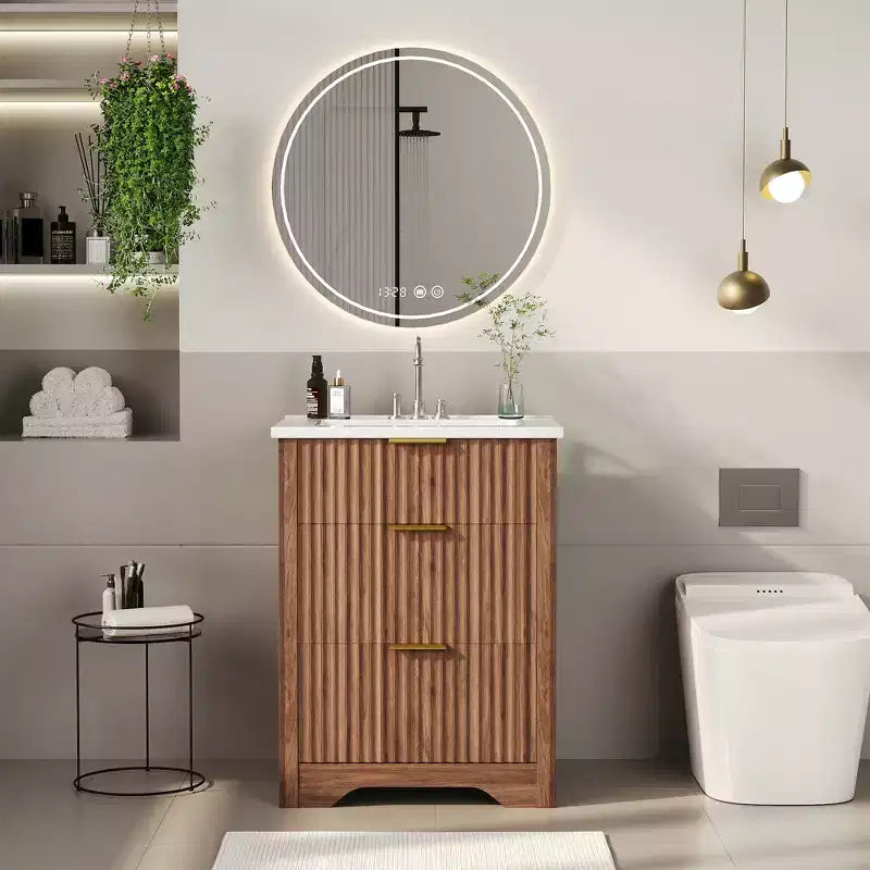 Meuble-lavabo de salle de bain moderne cannelé avec lavabo en céramique intégré, armoire de rangement autoportante avec 3 tiroirs pour salle de bain contemporaine.