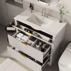 Meuble-lavabo de salle de bain moderne cannelé avec lavabo en céramique intégré, armoire de rangement autoportante avec 3 tiroirs pour salle de bain contemporaine.