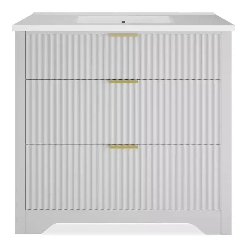 Meuble-lavabo de salle de bain moderne cannelé avec lavabo en céramique intégré, armoire de rangement autoportante avec 3 tiroirs pour salle de bain contemporaine.