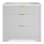 Meuble-lavabo de salle de bain moderne cannelé avec lavabo en céramique intégré, armoire de rangement autoportante avec 3 tiroirs pour salle de bain contemporaine.