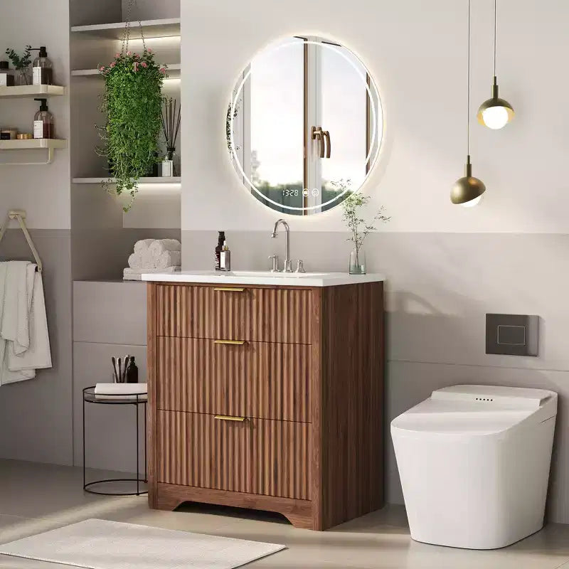 Meuble-lavabo de salle de bain moderne cannelé avec lavabo en céramique intégré, armoire de rangement autoportante avec 3 tiroirs pour salle de bain contemporaine.