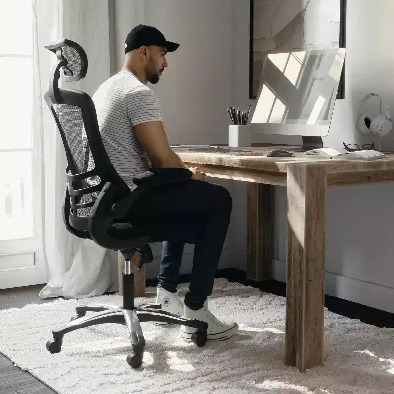 Fauteuil de bureau ergonomique de direction Flash Furniture Kelista à dossier haut en maille noire, pivotant, avec accoudoirs relevables et appuie-tête réglable